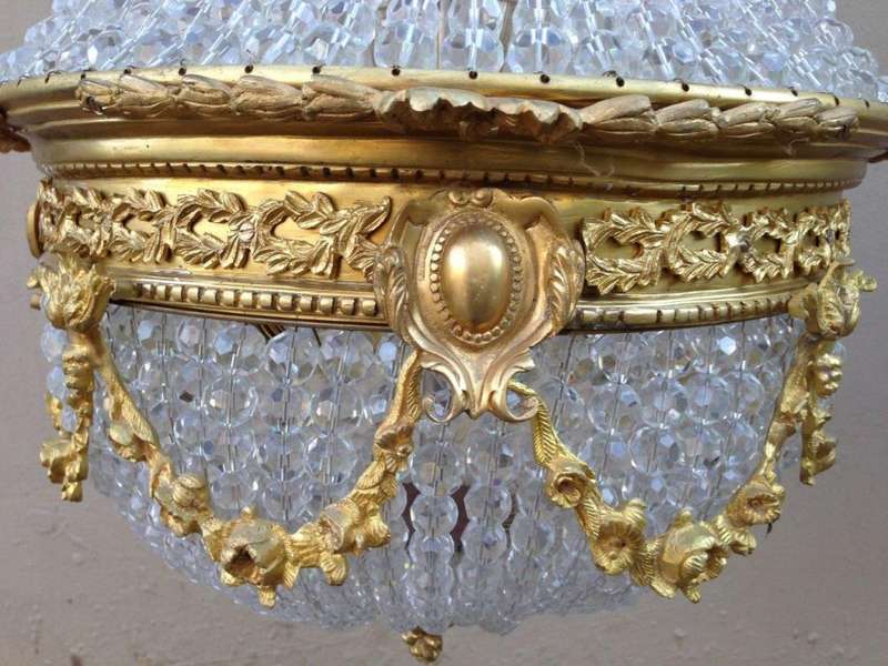 A 20th Century Empire Style Brass and Crystal Chandelier