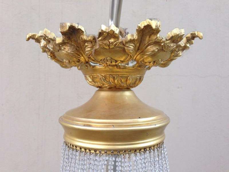A 20th Century Empire Style Brass and Crystal Chandelier