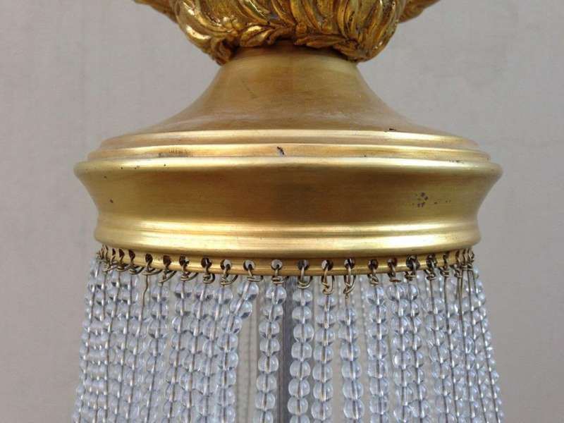 A 20th Century Empire Style Brass and Crystal Chandelier