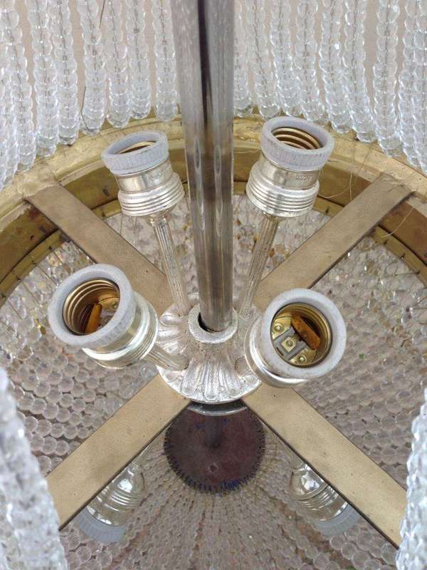 A 20th Century Empire Style Brass and Crystal Chandelier