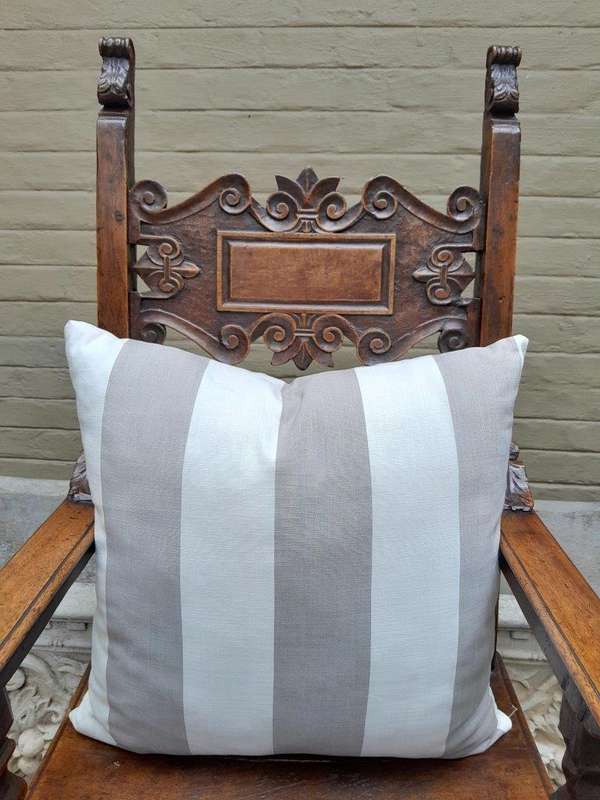 A Grey & White Stripped Cushion