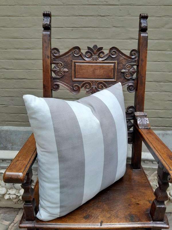 A Grey & White Stripped Cushion