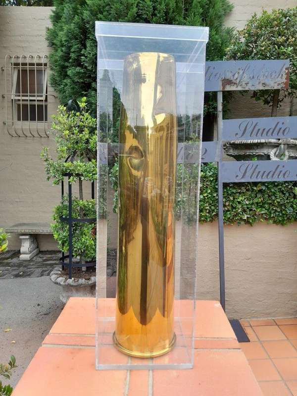 A 20TH Century Brass Cannon Shell In A Custom-Made Display Perspex Box