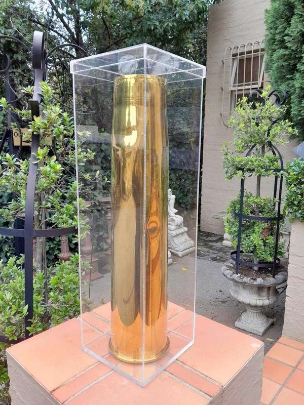 A 20TH Century Brass Cannon Shell In A Custom-Made Display Perspex Box