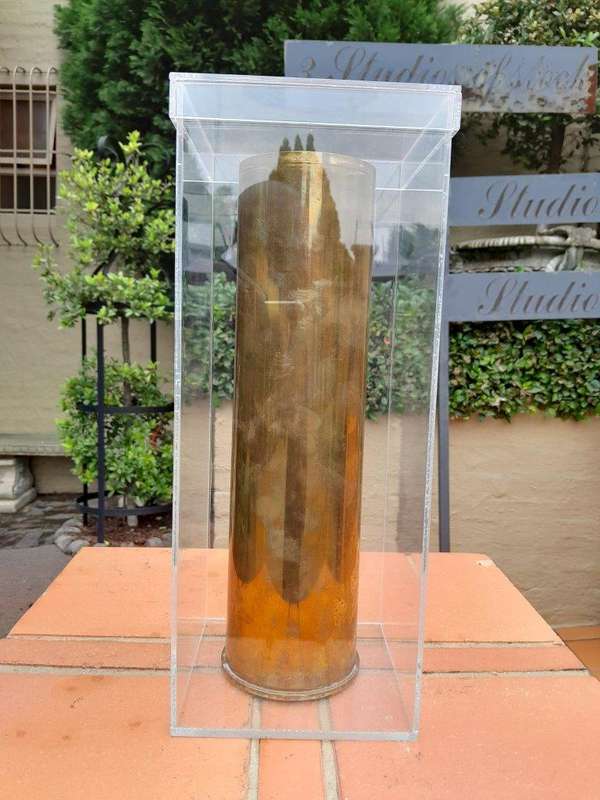 A 20TH Century Brass Cannon Shell In A Custom-Made Display Perspex Box