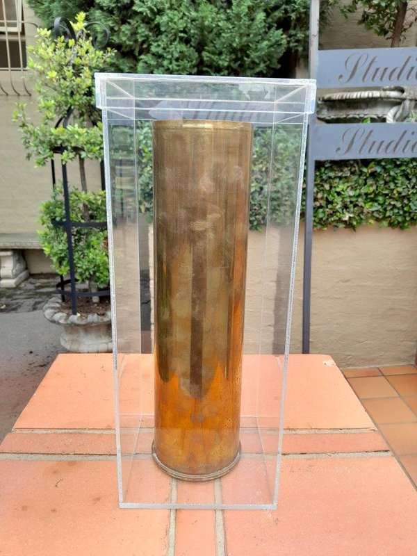 A 20TH Century Brass Cannon Shell In A Custom-Made Display Perspex Box