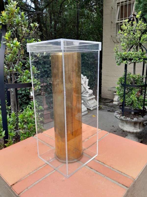 A 20TH Century Brass Cannon Shell In A Custom-Made Display Perspex Box