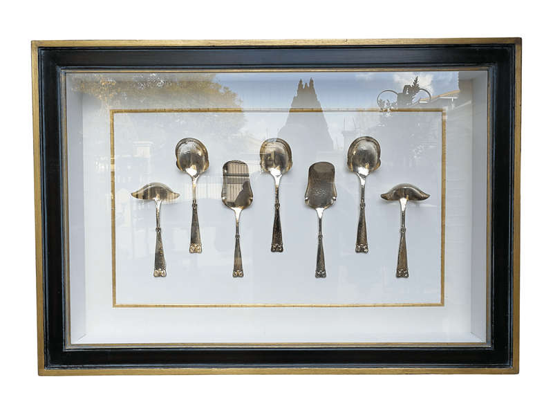 A Collection of Silver Plate Serving Flatware Framed in a Hand-made Frame