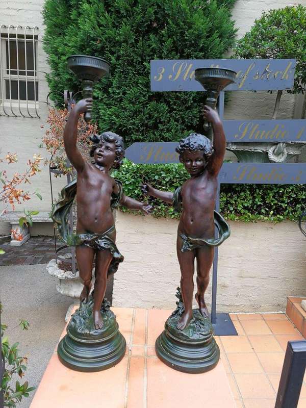 A Pair Of Antique Figural Lamps