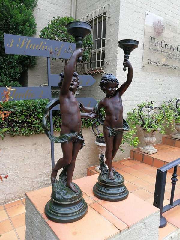 A Pair Of Antique Figural Lamps