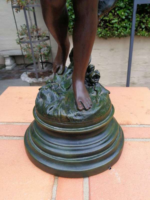 A Pair Of Antique Figural Lamps