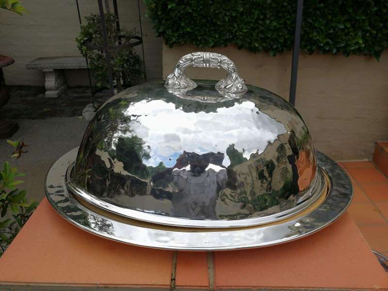 An Italian  Silver Plate Food Dome With Undertray And Wooden Cutting Board