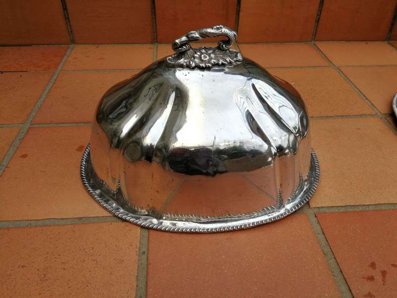 A late 19th century set of four graduated silver-plate food domes ND