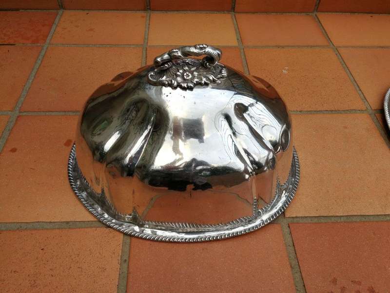 A late 19th century set of four graduated silver-plate food domes ND