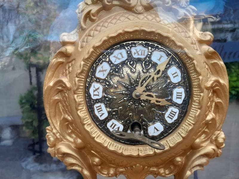 A 19th Century French Gilt Metal Clock in Glass Cloche with Hand Gilded Wooden Base