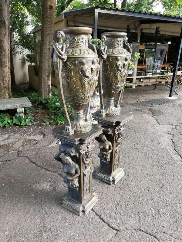 A Pair of Large Size Bronze Urns on Plinths