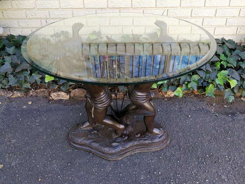 A Large Bronze Cherub Table Base with Glass Top ND