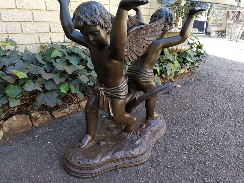 A Large Bronze Cherub Table Base with Glass Top ND