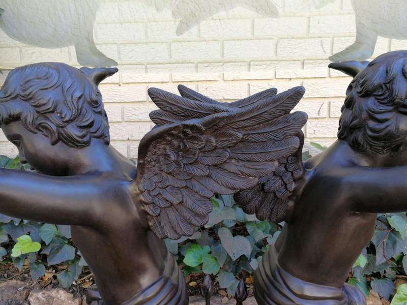 A Large Bronze Cherub Table Base with Glass Top ND