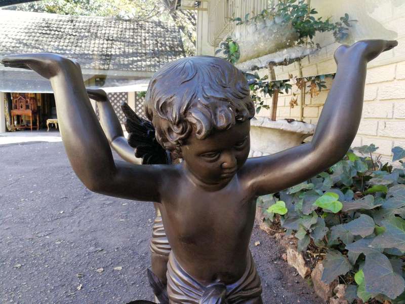 A Large Bronze Cherub Table Base with Glass Top ND