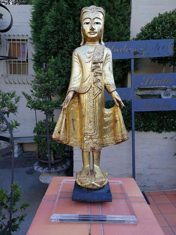 A Large Decorative Carved Gilded Statue On A Custom-Made Perspex Base ND