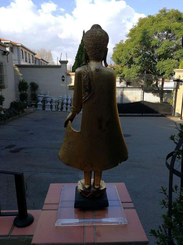 A Large Decorative Carved Gilded Statue On A Custom-Made Perspex Base ND