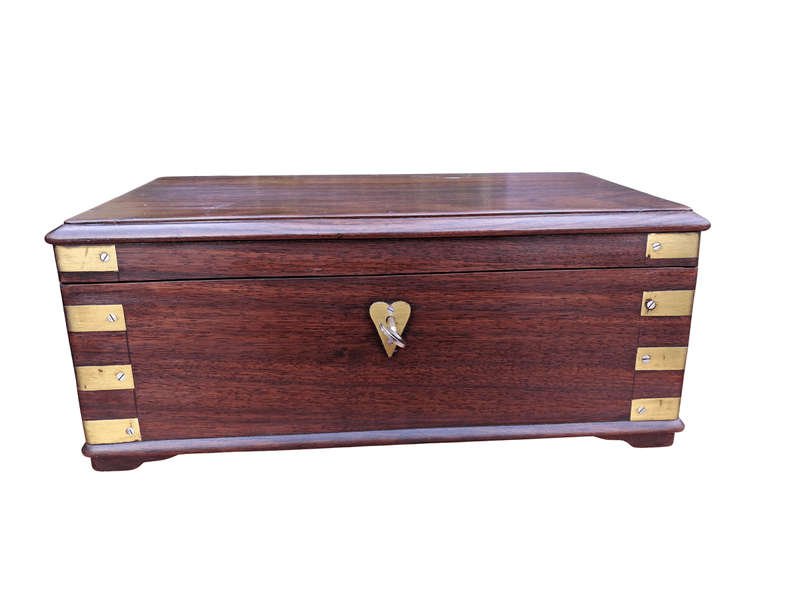 A Mahogany Polished Box With Brass details and Escutcheon and Key
