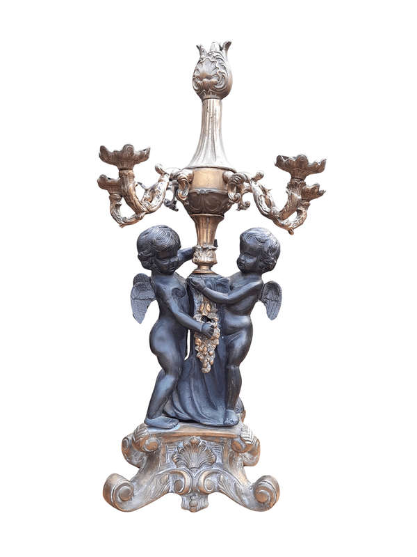 An Antique Brass And Bronze Five Arm Cherub Candelabra