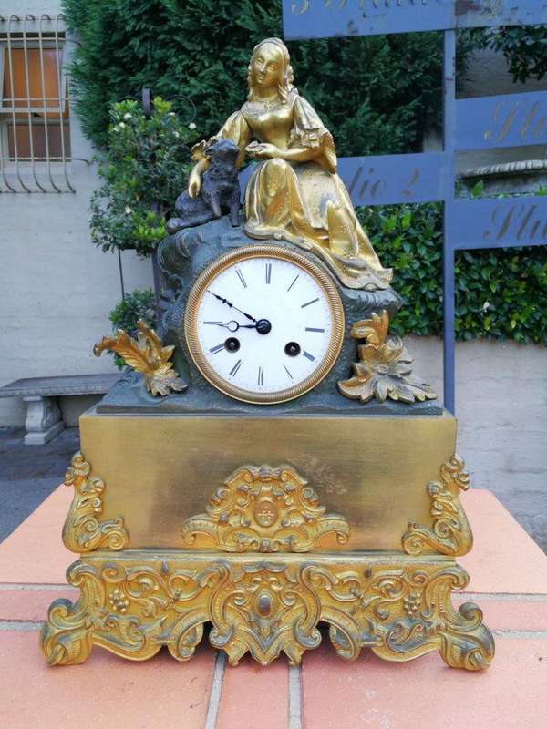 An Mid-19th Century French Gilt  Bronze Clock Complete With Pendulum And Key, Circa 1850s