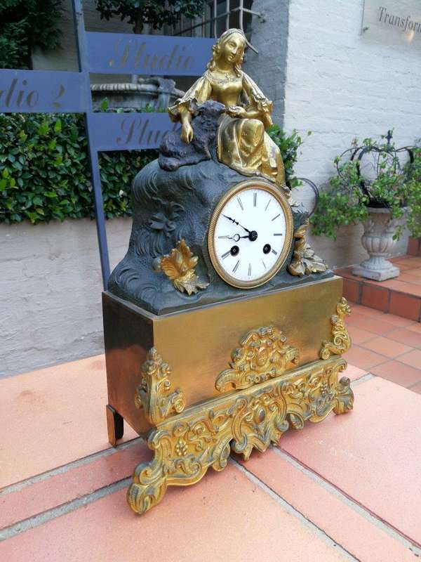 An Mid-19th Century French Gilt  Bronze Clock Complete With Pendulum And Key, Circa 1850s
