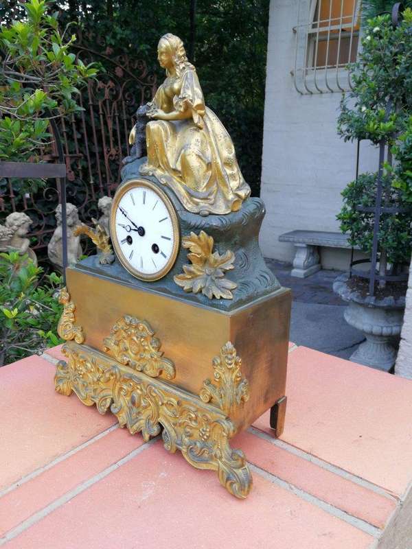 An Mid-19th Century French Gilt  Bronze Clock Complete With Pendulum And Key, Circa 1850s