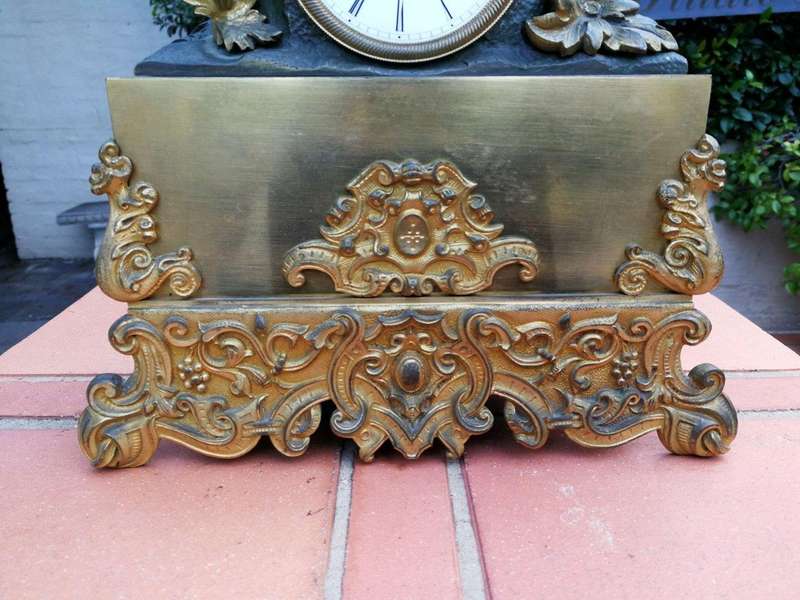 An Mid-19th Century French Gilt  Bronze Clock Complete With Pendulum And Key, Circa 1850s