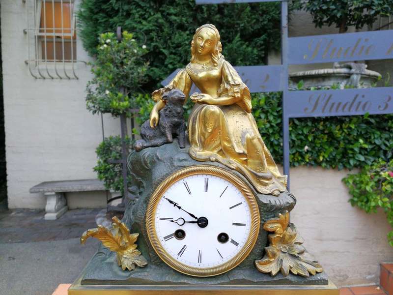 An Mid-19th Century French Gilt  Bronze Clock Complete With Pendulum And Key, Circa 1850s