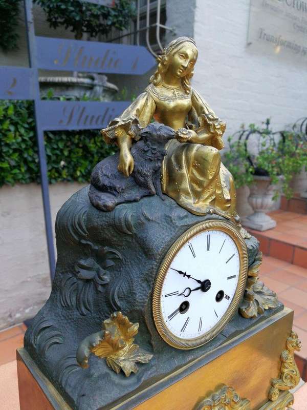 An Mid-19th Century French Gilt  Bronze Clock Complete With Pendulum And Key, Circa 1850s