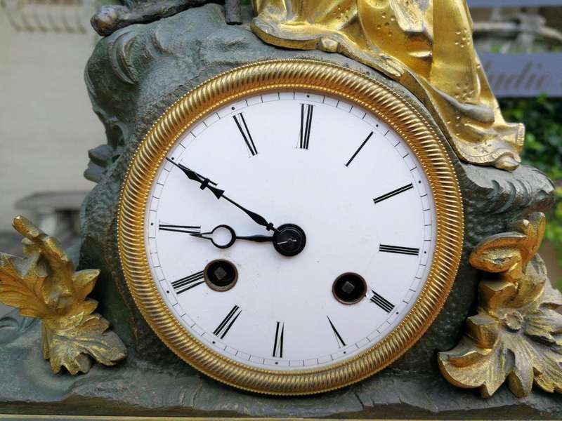 An Mid-19th Century French Gilt  Bronze Clock Complete With Pendulum And Key, Circa 1850s