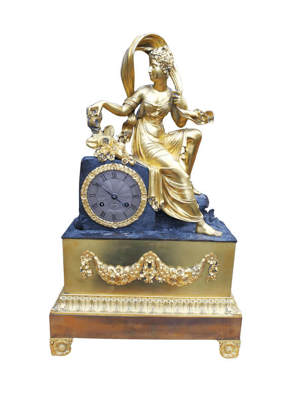 A Late 19th Century French Gilt And Bronze Clock With Pendulum