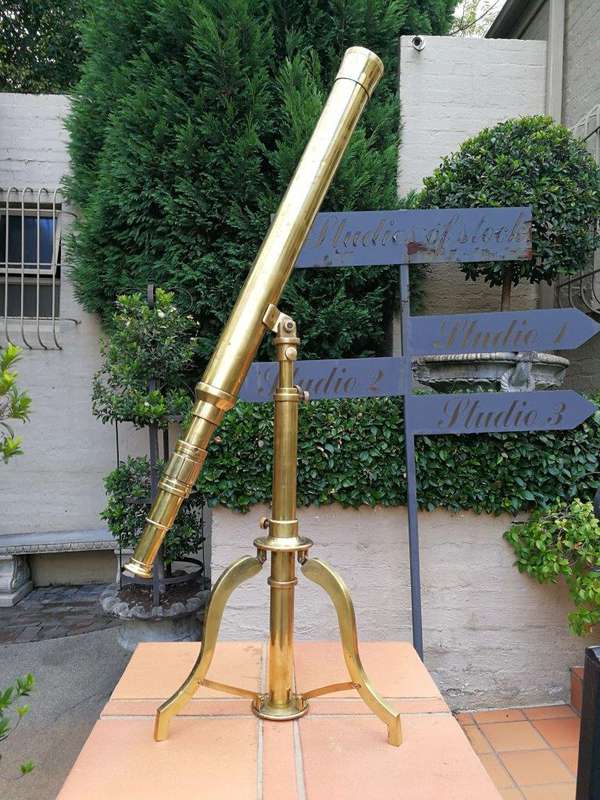 An Antique Brass Telescope On Tripod  By Stanley, London