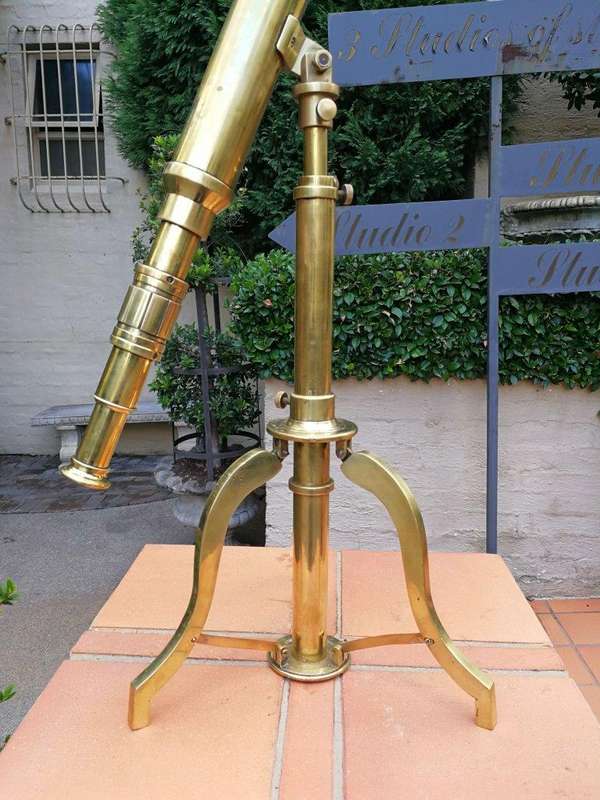 An Antique Brass Telescope On Tripod  By Stanley, London