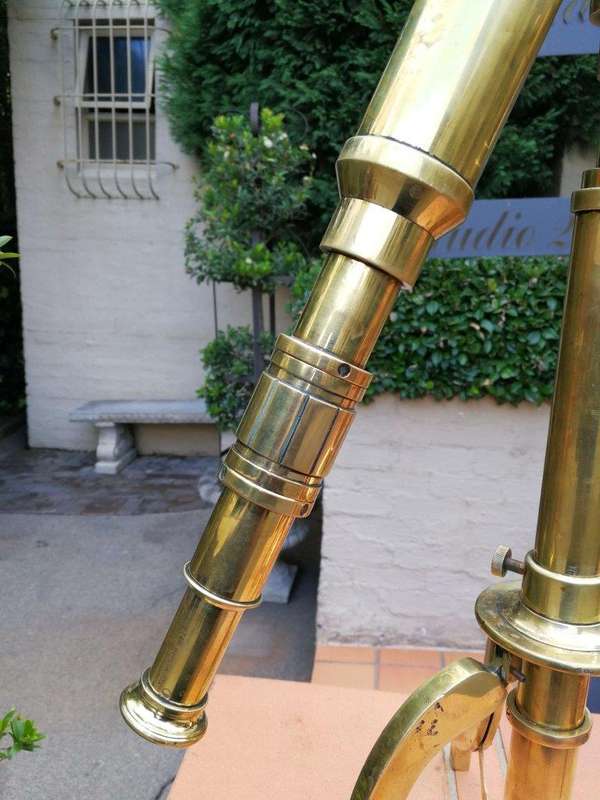 An Antique Brass Telescope On Tripod  By Stanley, London