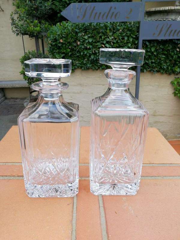 A Set Of Two Cut Crystal Decanters