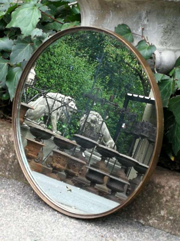 A 20th Century Rotating Cake/Sandwich Stand With Mirror And Brass Frame On Wooden Base