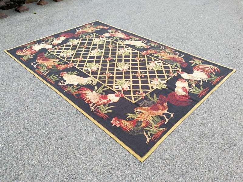 A Needlepoint Woven Carpet