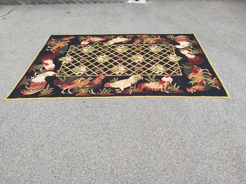 A Needlepoint Woven Carpet