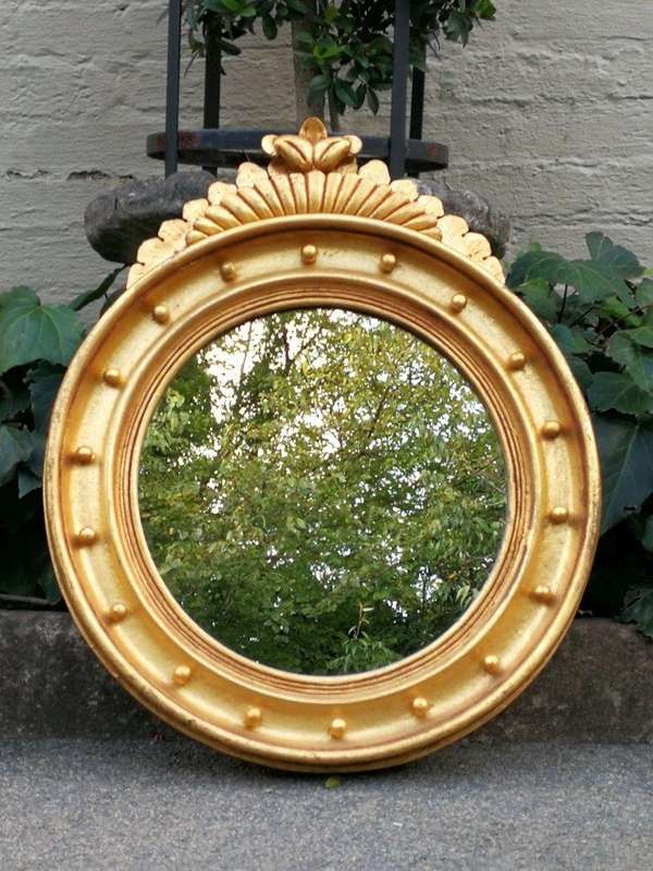 A Large Giltwood Regency Convex Mirror