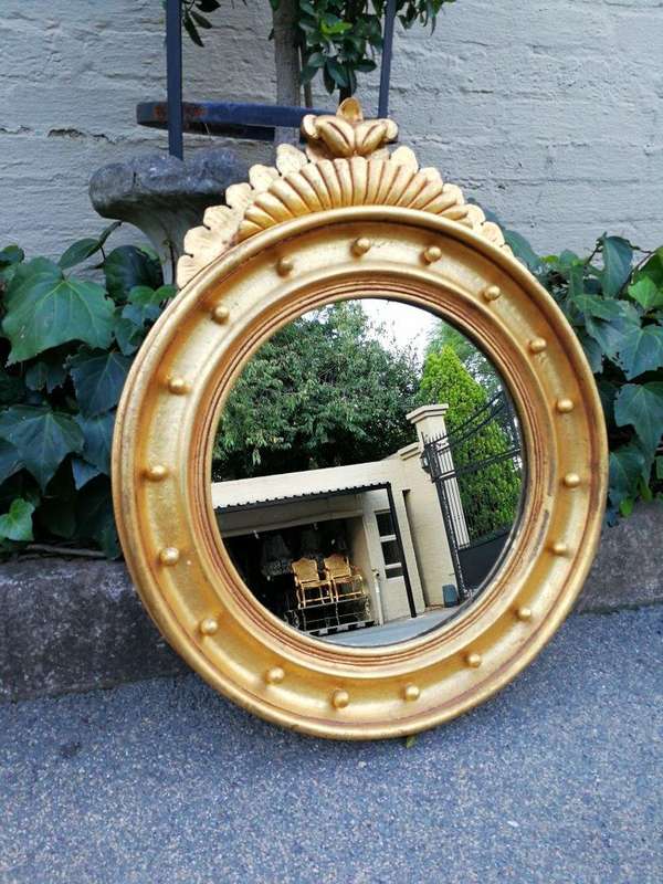 A Large Giltwood Regency Convex Mirror