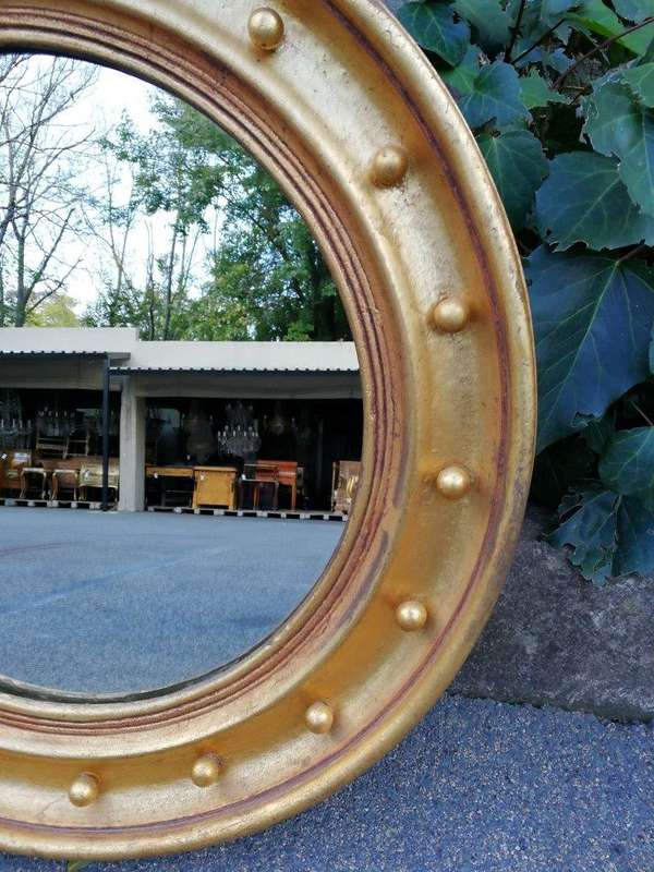 A Large Giltwood Regency Convex Mirror