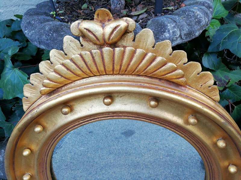 A Large Giltwood Regency Convex Mirror