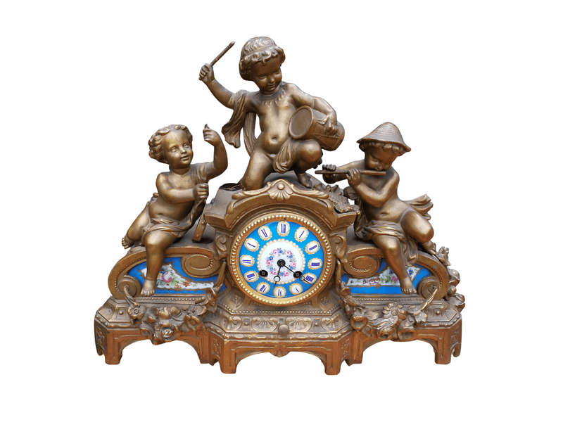 A 20th Century French Spelter And Gilt And Spelter Clock With Porcelain Plaques. Has Key And Pen...