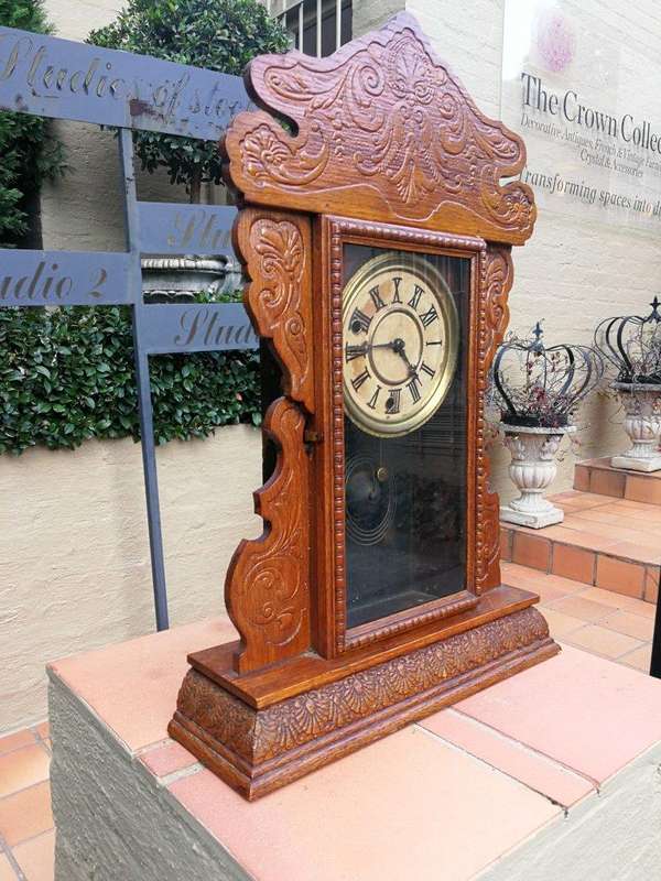 An Early 20th Century  Ornate Carved Oak Mantel Clock