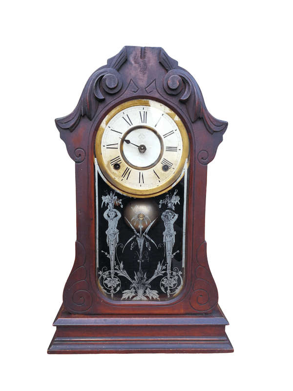 An Early 20th Century American Carved Oak Mantel Clock